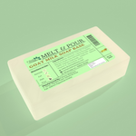Load image into Gallery viewer, A rectangular block of Goat Milk Melt & Pour Soap Base with product information printed on it, set against a light green background.